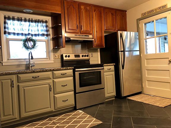 Granite countertops with all new appliances. Side entry door from the carport.