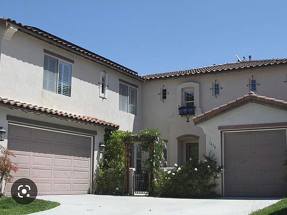 2 car garage and 1 car garage with Culligan Water whole household water filtration