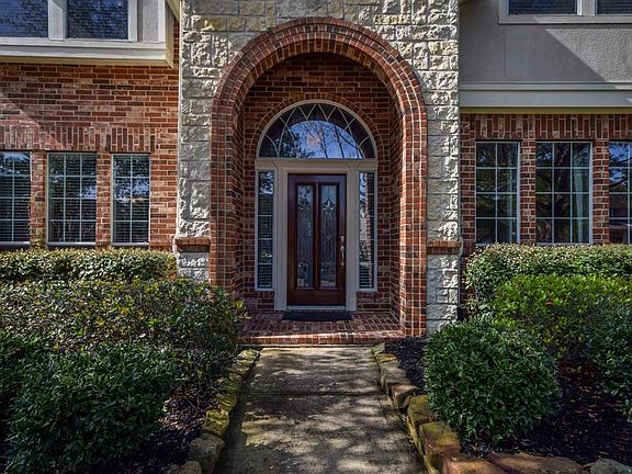 Elegant front entry with leaded glass front door.