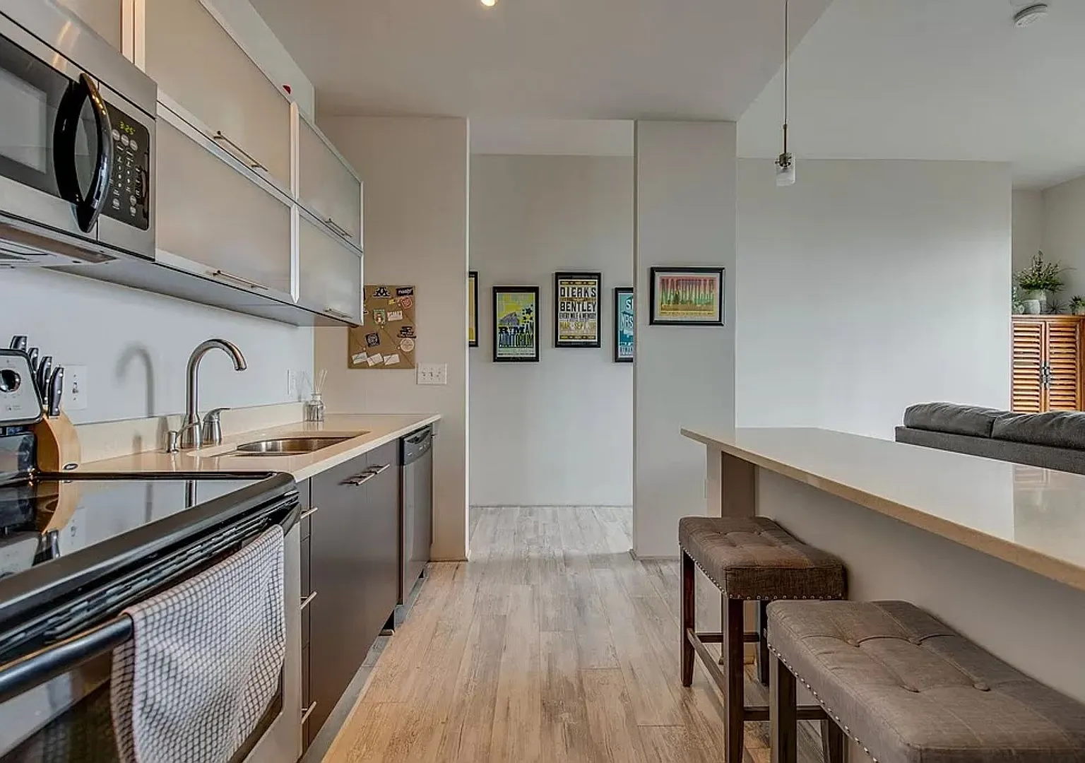 1 Bed/1 Bath Condo at 5th and Main, Assigned Parking, Washer/Dryer/Covered Balcony — Photo 2