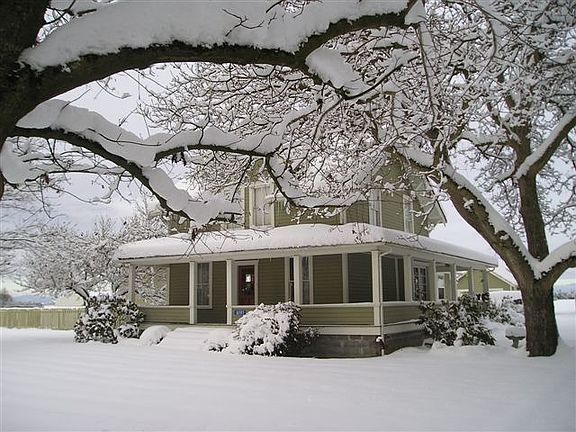 Snow on McLean Rd.  Both parcels, pasture and guest cottage & outbldgs 4 sale