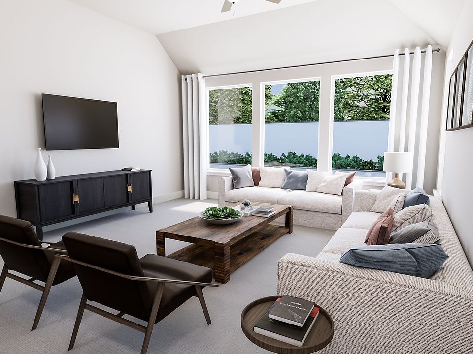 A modern and minimalist living room with large windows overlooking a lush, green outdoor space, feat