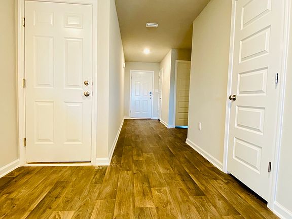 Entry Way, garage door left, front door center