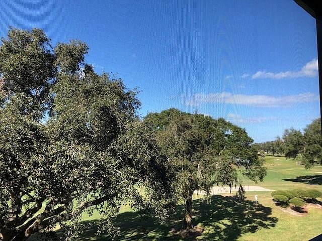 View from our lanai. 9th hole of IMG golf course.