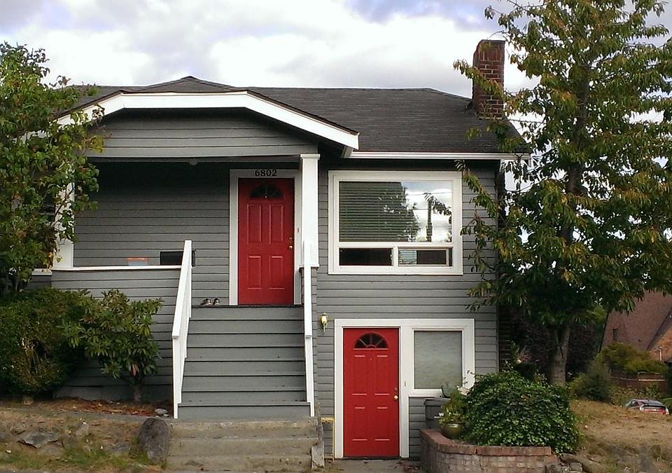 Upper unit entry on the left with nice porch out front.