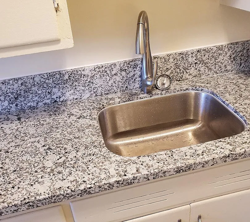 New Granite Countertop, New Sink, and New Faucet