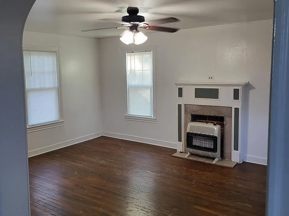 family room- "mock fireplace" gas heater installed-view from dining area