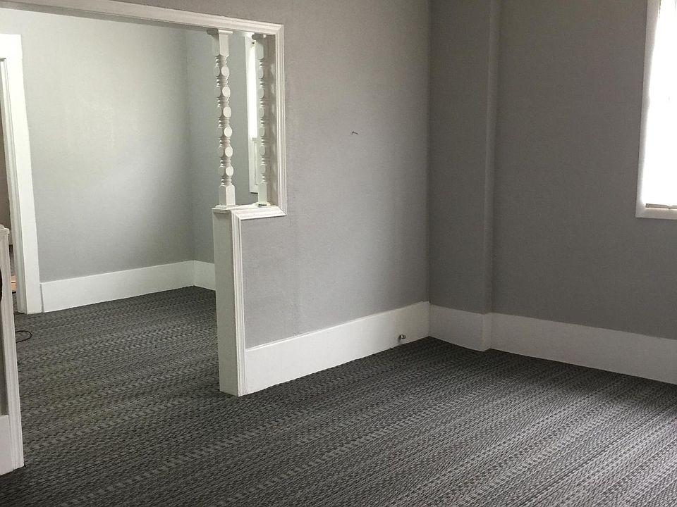 Living room and partial view of dining room