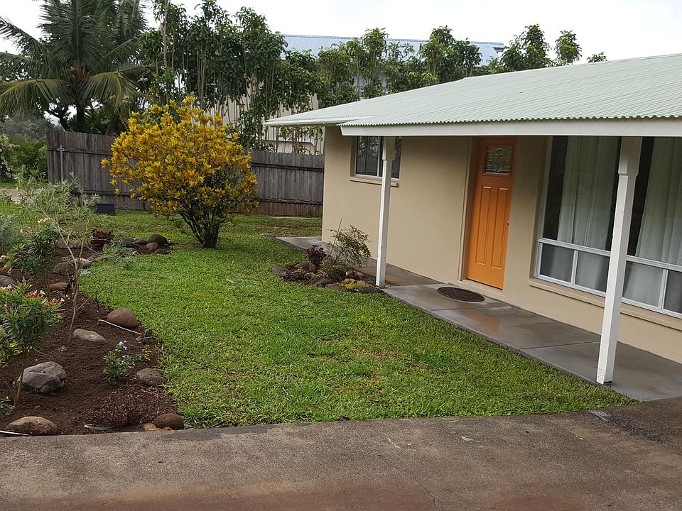 from driveway; new landscaping