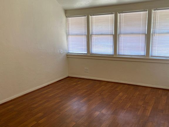Spacious Living Room
Overhead Ceiling Fan with Light
Nice Laminate Hardwood Floors