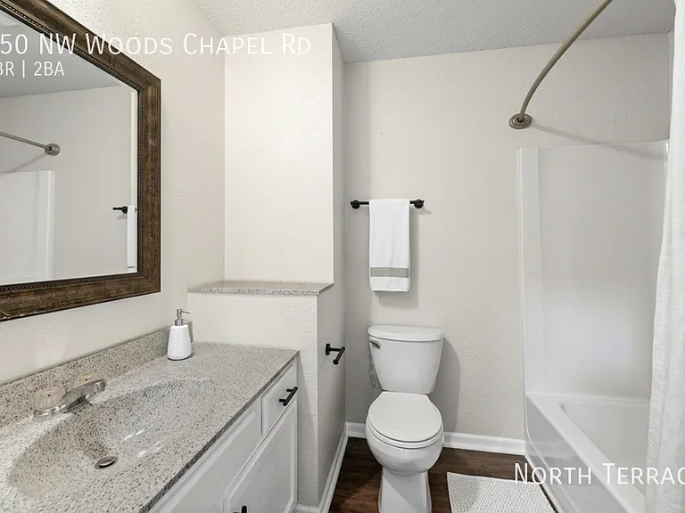 250 NW Woods Chapel Rd — Photo 5
