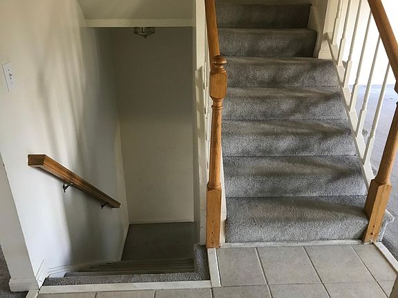 Foyer to basement and upstairs
