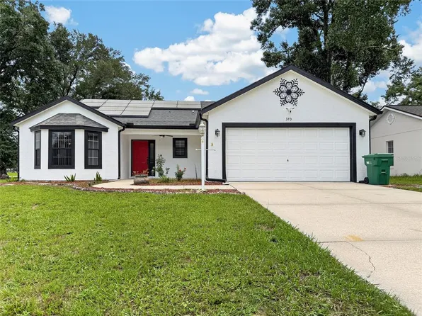370 CARRIAGE LANE, LADY LAKE, FL 32159