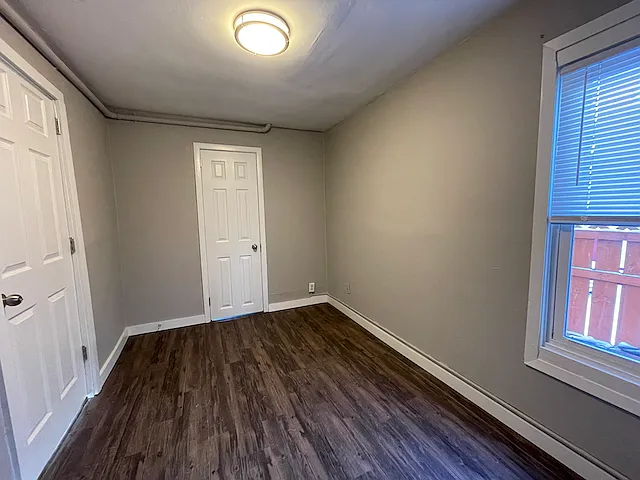 Second bedroom with a large walk-in closet.