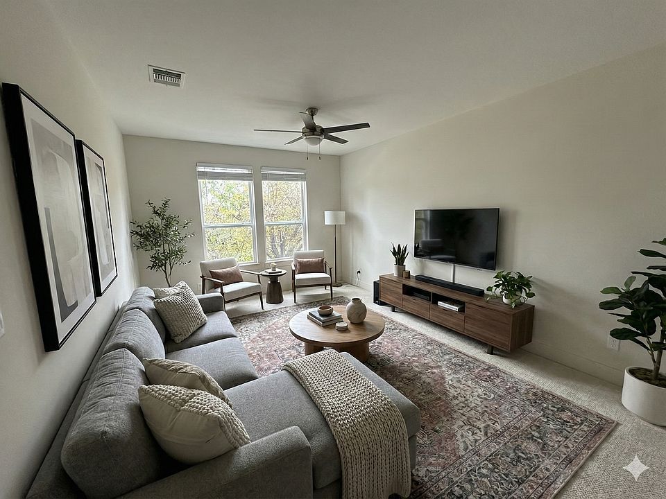 Upstairs living room. Staged with Gemini 3.0