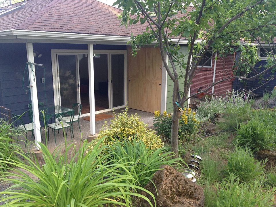 Entrance to apartment are the sliding glass doors. To the right of the door is a storage area for extra stuff.