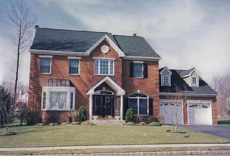 MAGNIFICENT BRICK FRONT COLONIAL