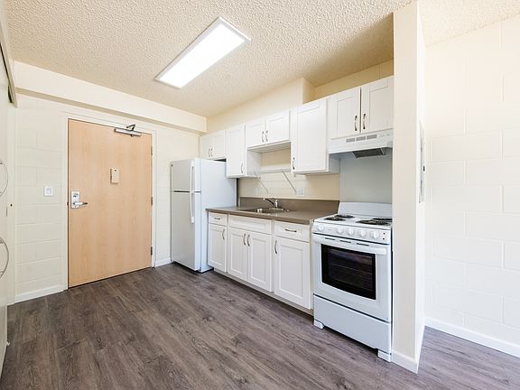Modern kitchen with updated appliances and ample counter space.