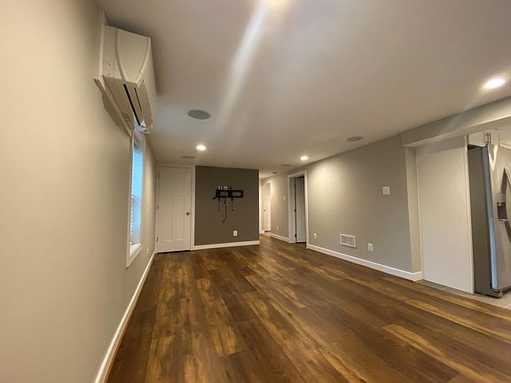 Open Living Room / Dining Room. TV Bracket, In-ceiling speakers, recessed lighting.