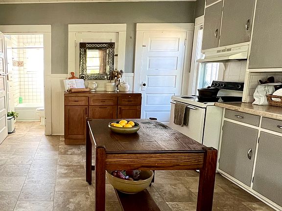 Kitchen, with view of door to bathroom