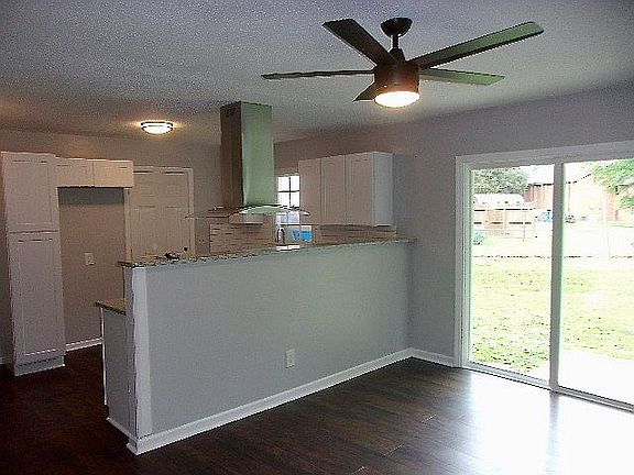 Kitchen opens to Dining Area