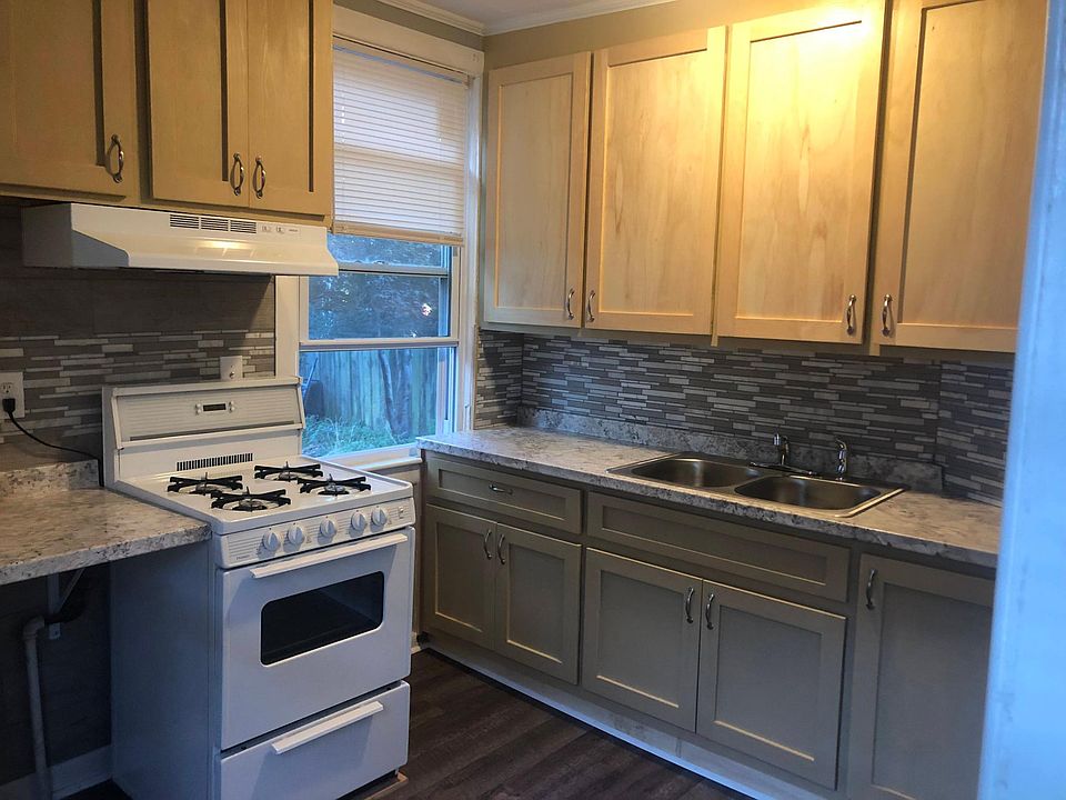 Newly updated kitchen with custom cabinets.
