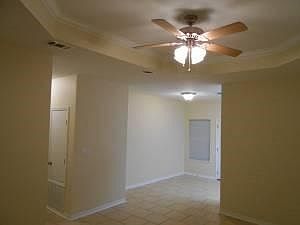 Entry to living room. 10' Trey ceiling with 6" white Crown Molding.