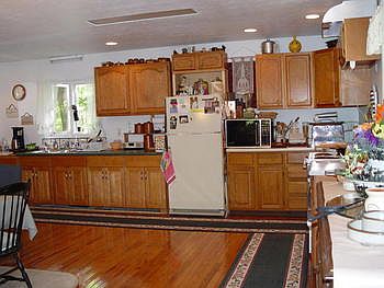 Do you need room with storage in the kitchen? There is alot of space to move around and you will love to entertain for many specail days to come.
