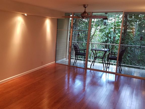 Living Room with Recessed Lighting & Fan
