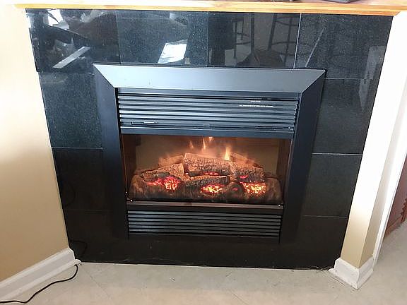 Electric fireplace w/black marble