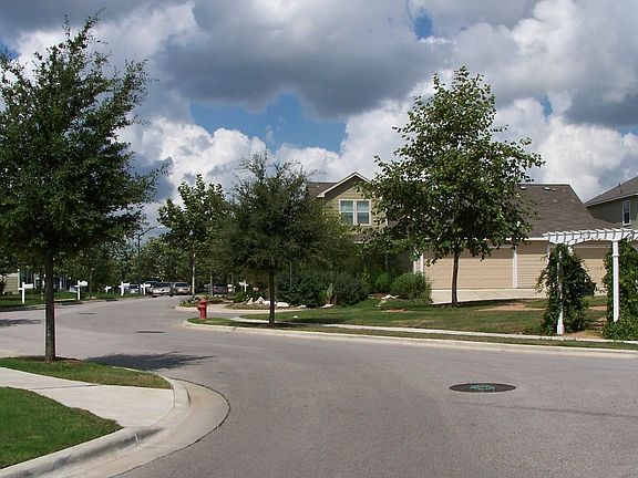 View of garage and back of house