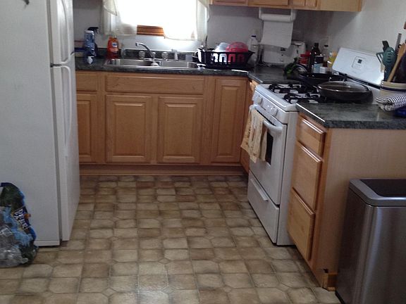 Kitchen view with frig and stove installed