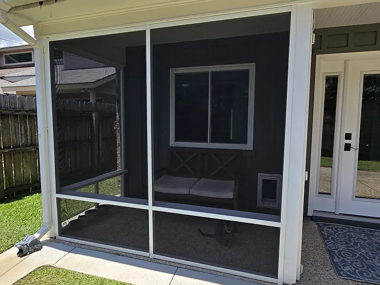 Catio - screened in patio with cat door access