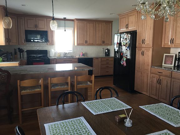 Kitchen with tons of cabinet space; Refrig, microwave, dishwasher, oven/stove stay; granite counters