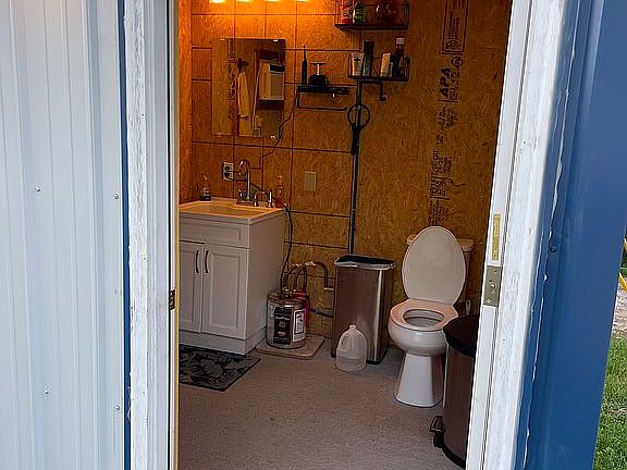 Detached restroom near shop