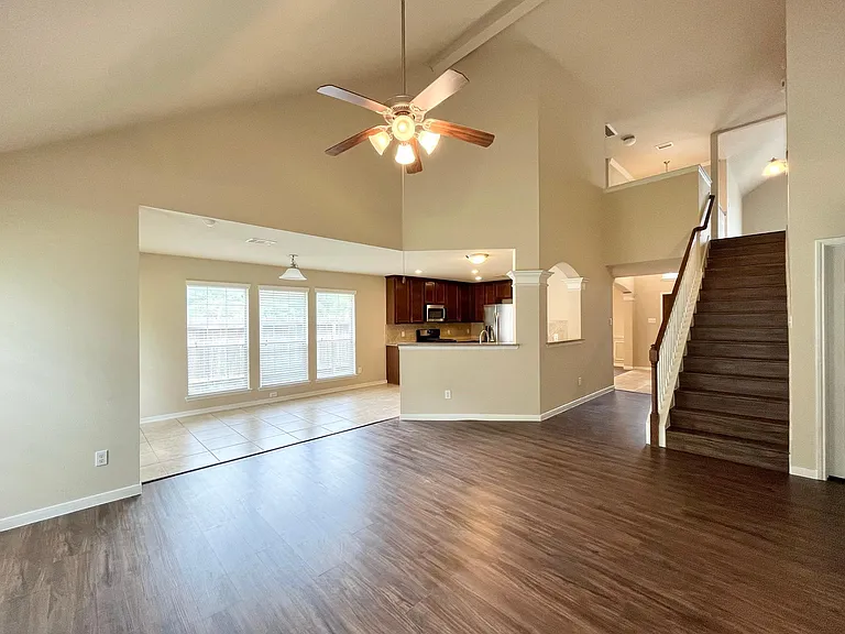 living room with high ceiling. open concept