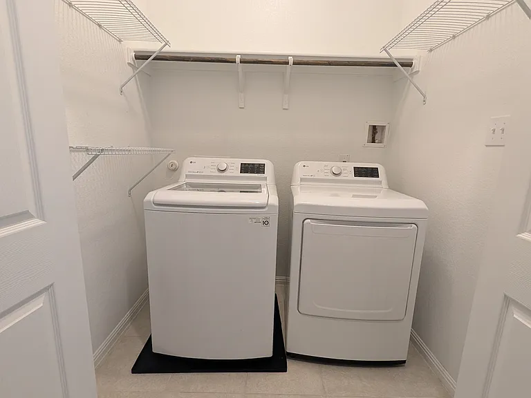 Laundry room. Washer & dryer included.