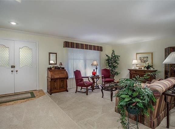 Enter into the sunken living room.