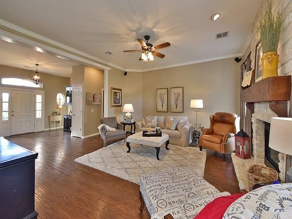 Living area with hand scraped wood floors