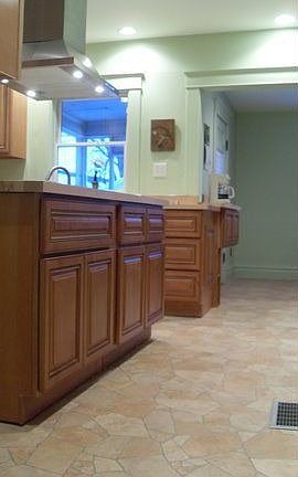 cinnamon Marquis cabinets w/ rope detail