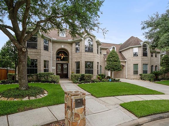 Beautiful curb appeal with established shade trees, shrubbery and lots of space to enjoy the outdoors.