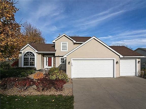 Welcome Home!Wide concrete drive and 3 stall garage.
