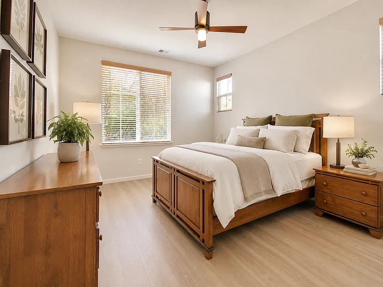 Downstairs bedroom with convenient access to a full bathroom.