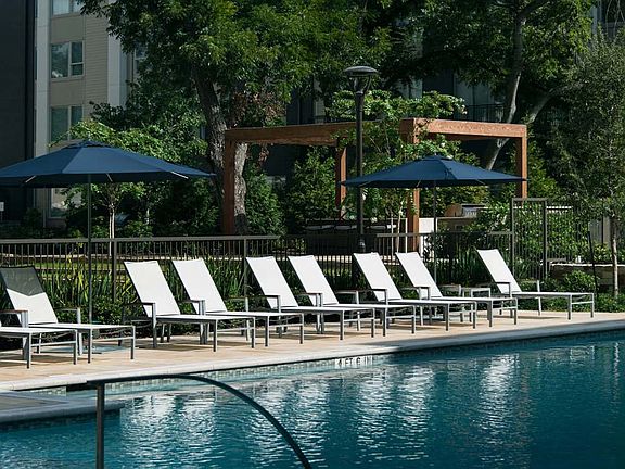 Swimming Pool With Relaxing Sundecks