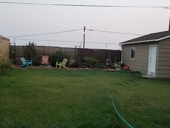 Large yard, fully fenced.