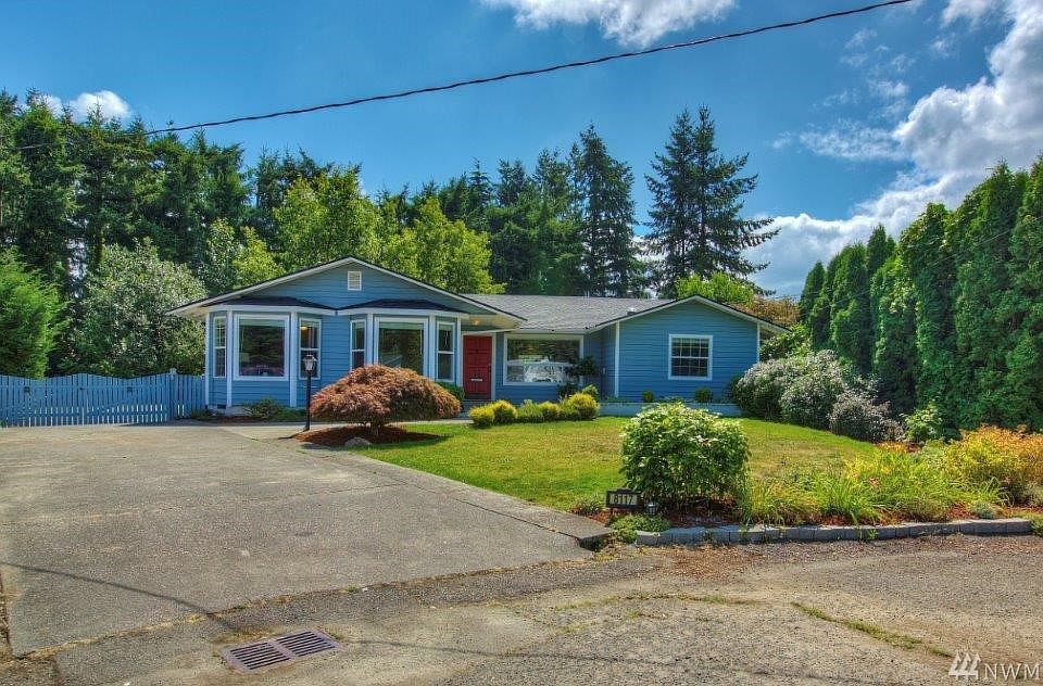 Turnkey Rambler with newer roof and low maintenance siding. Looks can be deceiving as it's much larger on the inside than it appears from the outside. Gated with RV/Boat parking and oversized garage is in back.