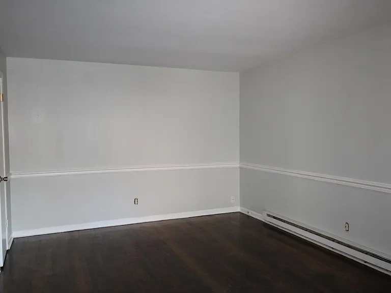 Living Room with electric baseboard heat.