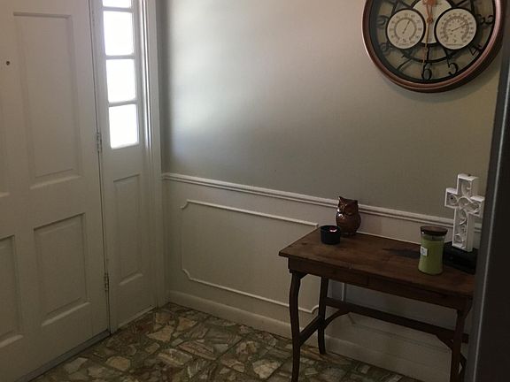 Foyer with large closet to the right.