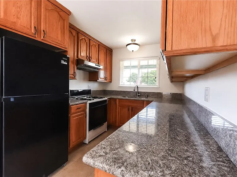 7002 Aura Ave — Photo 6