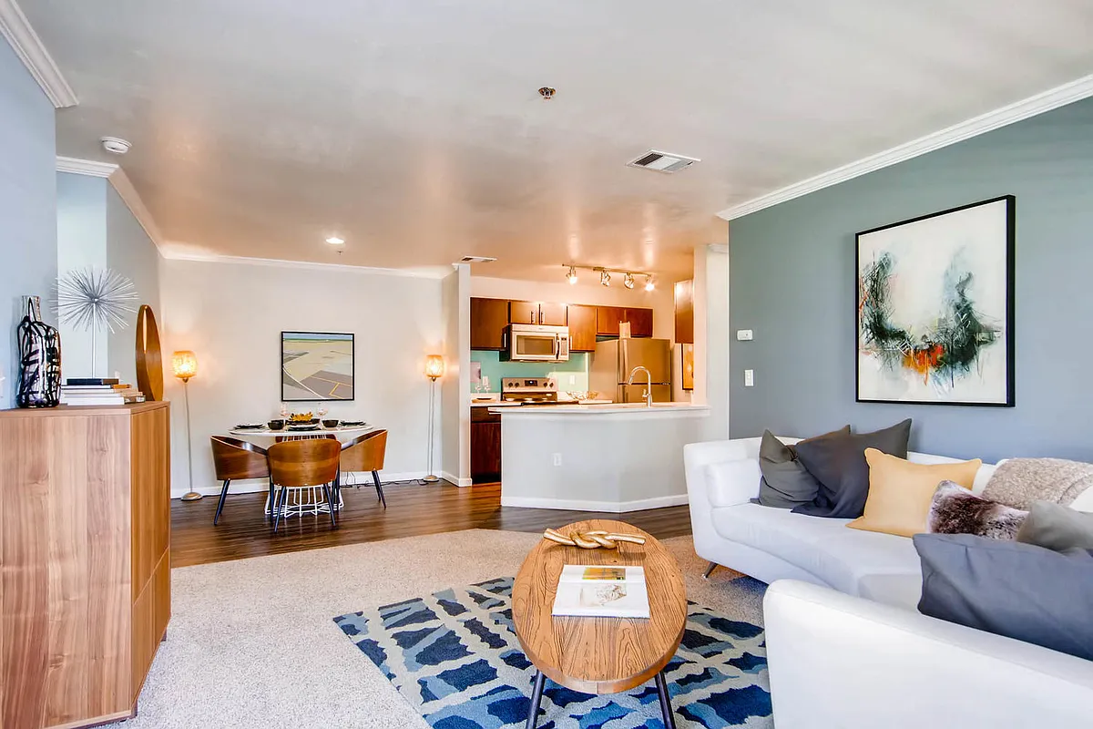 A Living Room and Kitchen at Eagles Landing at Church Ranch Apartments - Eagles Landing